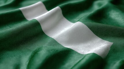 Close-Up View of Nigerian Flag Fabric with Green and White Colors and Waving Texture
