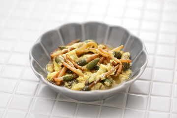 Japanese wild vegetable dish in spring. Tsukushi ( Field Horsetail ) simmered for a bit, and then added beaten eggs.