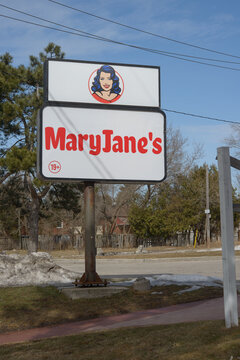 road sign at MaryJane's Weed Dispensary, a cannabis store, located at 239 Scarlett Rd in Toronto, Canada