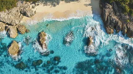 Aerial View of a Pristine Tropical Beach with Turquoise Water, Rocks, and White Sand