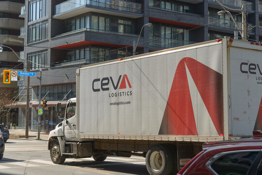 CEVA logistics semi transportation truck in traffic at Jarvis St and Dundas St E in Toronto, Canada 