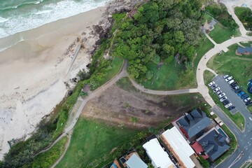 Aerial view looking down over the mud on Miami hill after cyclone Alfred. Gold Coast, Australia