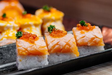 A close-up of the sushi on the plate. Concepcion of Japanese cuisine and proper nutrition.