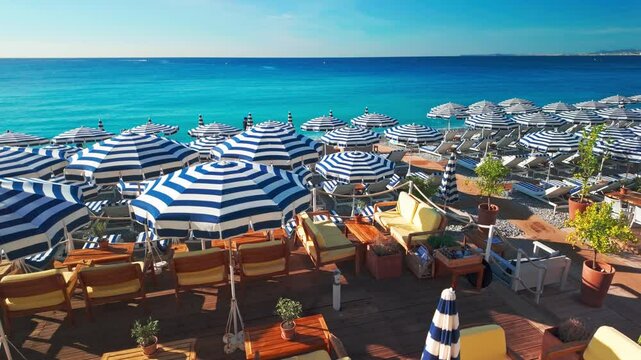 Beautiful beach and turquoise sea waters of the Cote d'Azur in Nice in summer