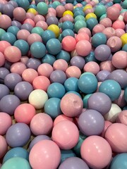 a collection of small, colorful plastic balls