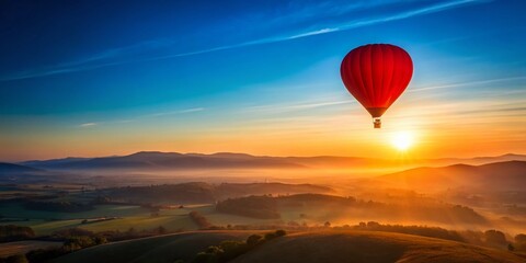Obraz premium Silhouette of Vibrant Red Balloon Ascending Over Breathtaking Scenic Landscape at Sunset