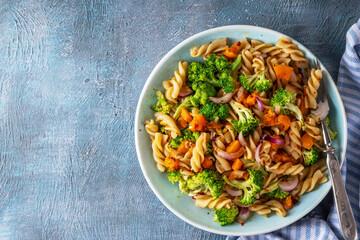 Pumpkin and broccoli vegan warm pasta salad