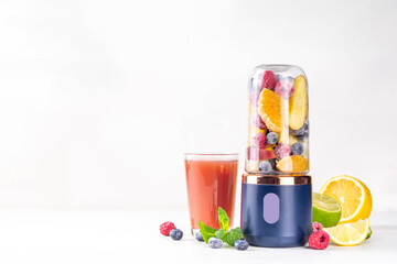 Healthy fruit and berry smoothie drink in portable blender