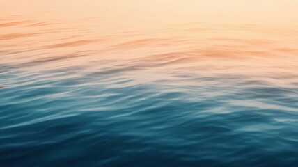 Fototapeta premium Serene Ocean Sunset: Blue and Orange Water Texture