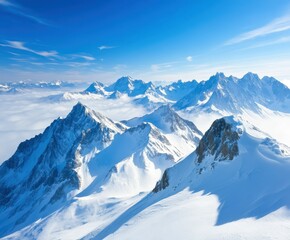 Obraz premium Snow-covered mountains under clear blue sky