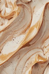 Whipped cream swirls with brown highlights