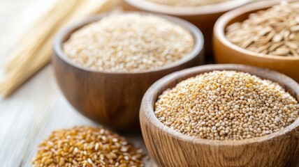 A colorful assortment of whole grains featuring brown rice, quinoa, oats, and barley displayed in bowls, representing a balanced diet for healthy living.
