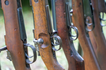 First and Second World War rifles lined up