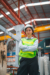 Female engineer, confident woman, showcases leadership and expertise in the industry. With technology and innovation, intelligent expert builds success, ensuring safety with a hard hat in her career.