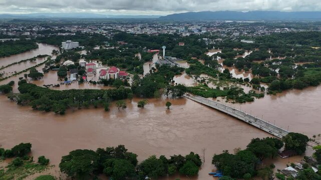 Aerial view of suburb area in Chiang Rai province flooding by Kok river after typhoon Yagi has swept Southeast Asia.