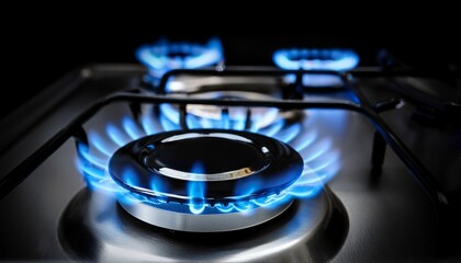 Gas stovetop cooker blue flame in the dark, kitchen burners closeup stock footage- 27199