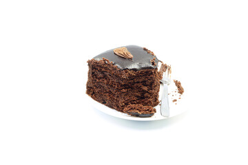 Piece of chocolate cake on white background.