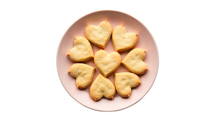 Heart-shaped cookies on pink plate, isolated cutout on transparent background. Delicious treat for Valentine's Day, romantic baking, food blogs, and bakery promotions.