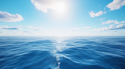 Fototapeta premium A serene ocean view under a bright blue sky, showcasing gentle waves and fluffy clouds, embodying tranquility and natural beauty.
