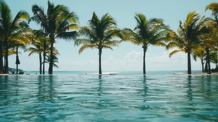 Obraz premium Tranquil Pool Scene with Palm Trees and Ocean View