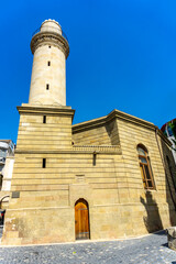 Obraz premium Famous Beyler mosque - Cordoba like mosque in Baku Azerbaijan built in 1894-1895. Above door Text translation: Beyler Mosque - built 1894, corner text - Beyler Mosque - 19th century.Dated.