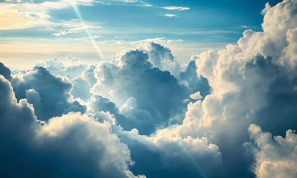 A beautiful, clear sky with fluffy white clouds and soft blue sky above.