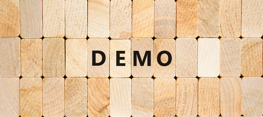 Demo symbol. Concept word Demo on beautiful wooden blocks. Beautiful wooden blocks background....