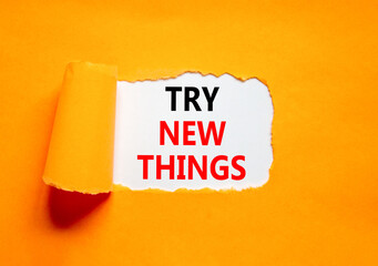 Try new things symbol. Concept words Try new things on beautiful white paper. Beautiful orange...