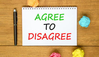 Agree to disagree symbol. Concept words Agree to disagree on beautiful white note. Black pen....