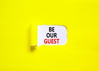 Be our guest symbol. Concept words Be our guest on beautiful white paper. Beautiful yellow paper background. Business and be our guest concept. Copy space.