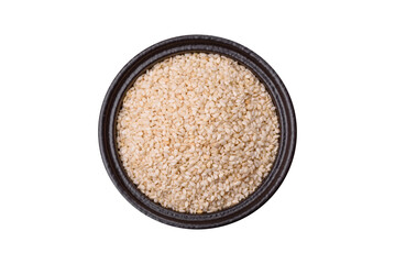 White sesame seeds in a bowl, an ingredient for making vegetarian food