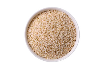 White sesame seeds in a bowl, an ingredient for making vegetarian food