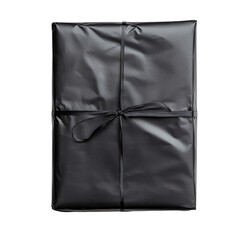 Obraz premium Black gift wrapped present tied with ribbon simple elegant design