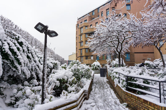 Snowy day in L&eacute;nine street. Ivry-sur-Seine city. 