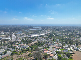 Fototapeta premium Aerial view of middle class houses in the valley of Oceanside town in San Diego, California. USA.