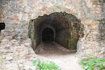 Defensive fortification, Tarakanovsky fort, ruins of the fortress. Long abandoned tunnel, catacombs