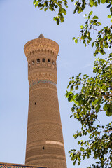 Minaret seen from the inner courtyard of the Khoja Kalon madrassa site in Bukhara