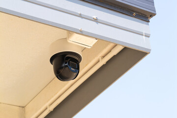 Surveillance installation on building edge urban setting technology outdoor close-up view