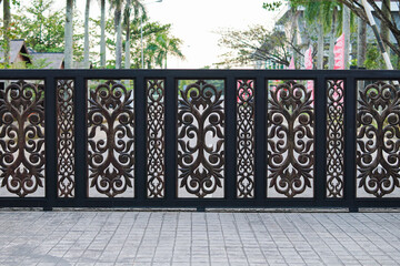 A row of wooden fences decorated with patterns and details