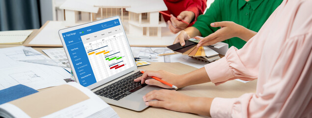 Project planning software for brisk business project management on the computer screen showing...