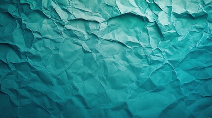 Textured crumpled green paper abstract background design.