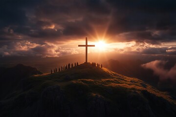Cross on a hill with group silhouettes at sunset