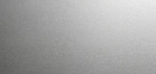 Grey cardboard texture background with rough paper surface. Blank fiberboard material pattern with copy space. Industrial grunge wallpaper sample. Use for design element, canvas mockup, banner