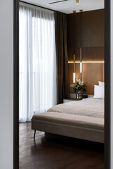 Modern bedroom interior with elegant decor and cozy lighting