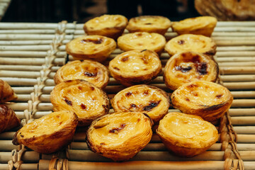 Traditional Portuguese dessert pasteis de nata, served fresh in Lisbon