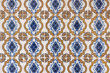 Close-up of traditional azulejo tiles on a historic facade in downtown Lisbon