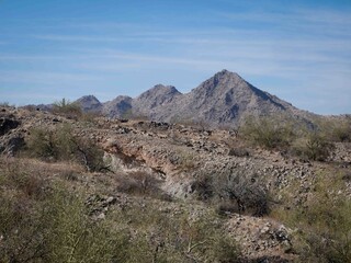 Desert terrain in southwest Phoenix Arizona near Buckeye with mountains and washes and ravines