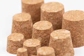 A set of large and small natural corks for glassware.