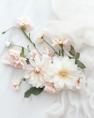 Fototapeta premium Elegant floral arrangement on soft fabric background 