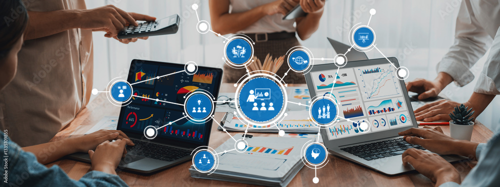 Fototapete teams collaborate in a modern workspace, analyzing data on laptops and discussing insights through i